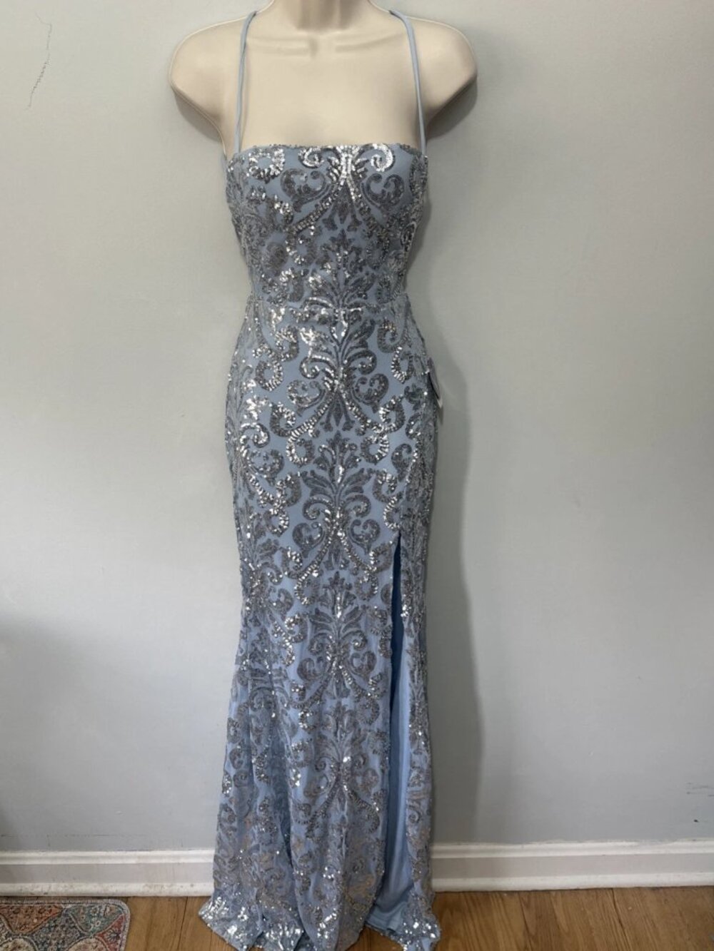 Ms. Vistodino Windsor's blue lace evening dress